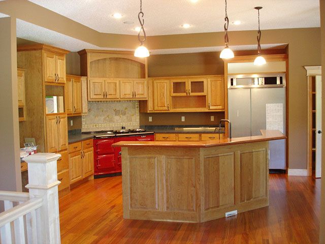 Kitchen with warm finished wood cabinetry